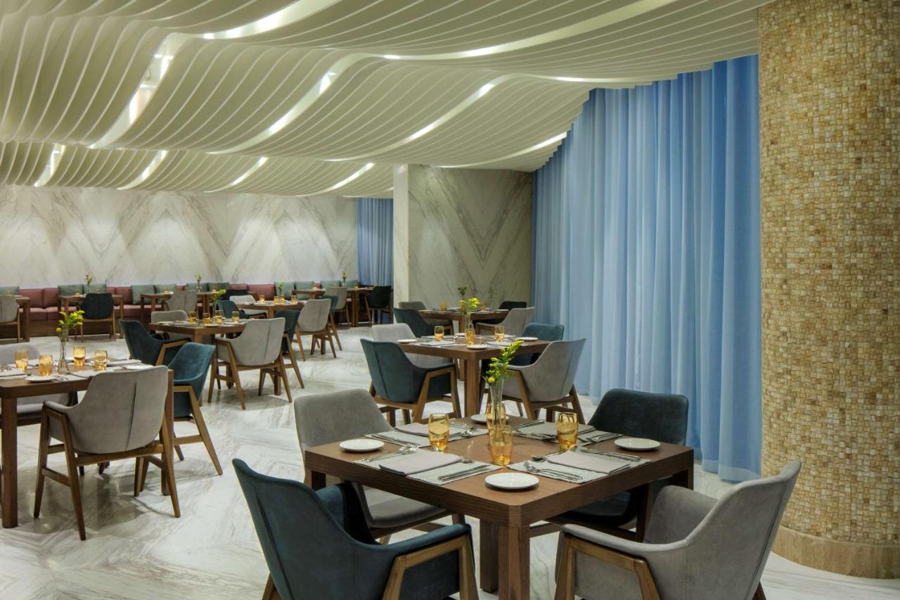 Radisson Blu Hotel Apartment Dubai Silicon Oasis Extérieur photo